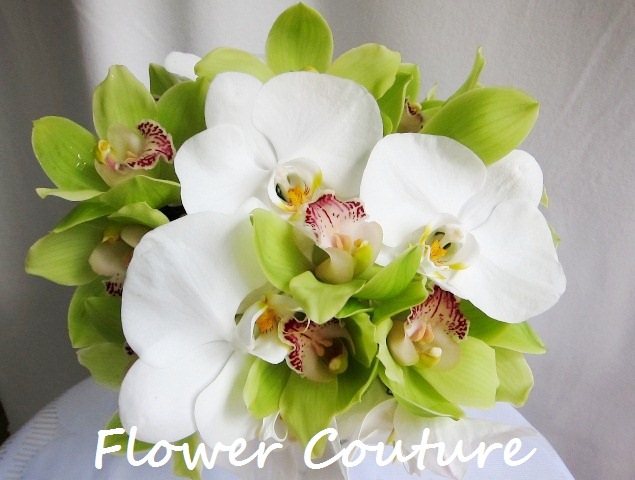 Flower Couture's rendition - we preferred to keep it really elegant and clean with the use of phalaenopsis and cymbidiums only. 