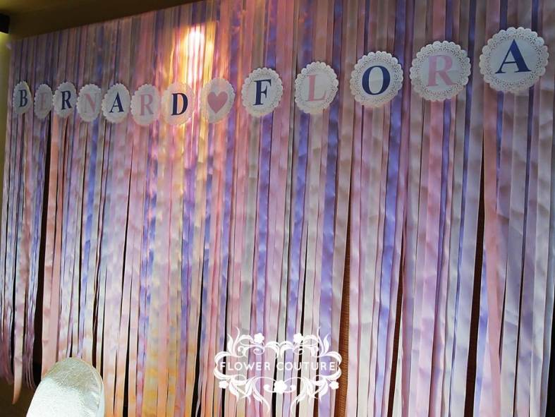 Flower Couture's version of a ribbon backdrop with the couple's names. It was a thrill putting this style together. 