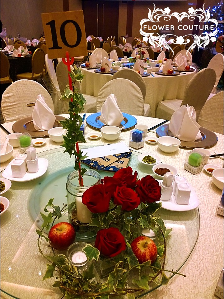 Table Centrepiece Display - roses, candles, red apples, custom made table numbers.